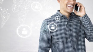 image by rawpixel. Com on freepik Cheerful Man Talking Phone